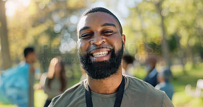 Buy stock photo Black man, portrait and happy in park for donation, volunteer and community service work with smile. African person, charity and eco friendly outdoor for change, project and sustainability with NGO