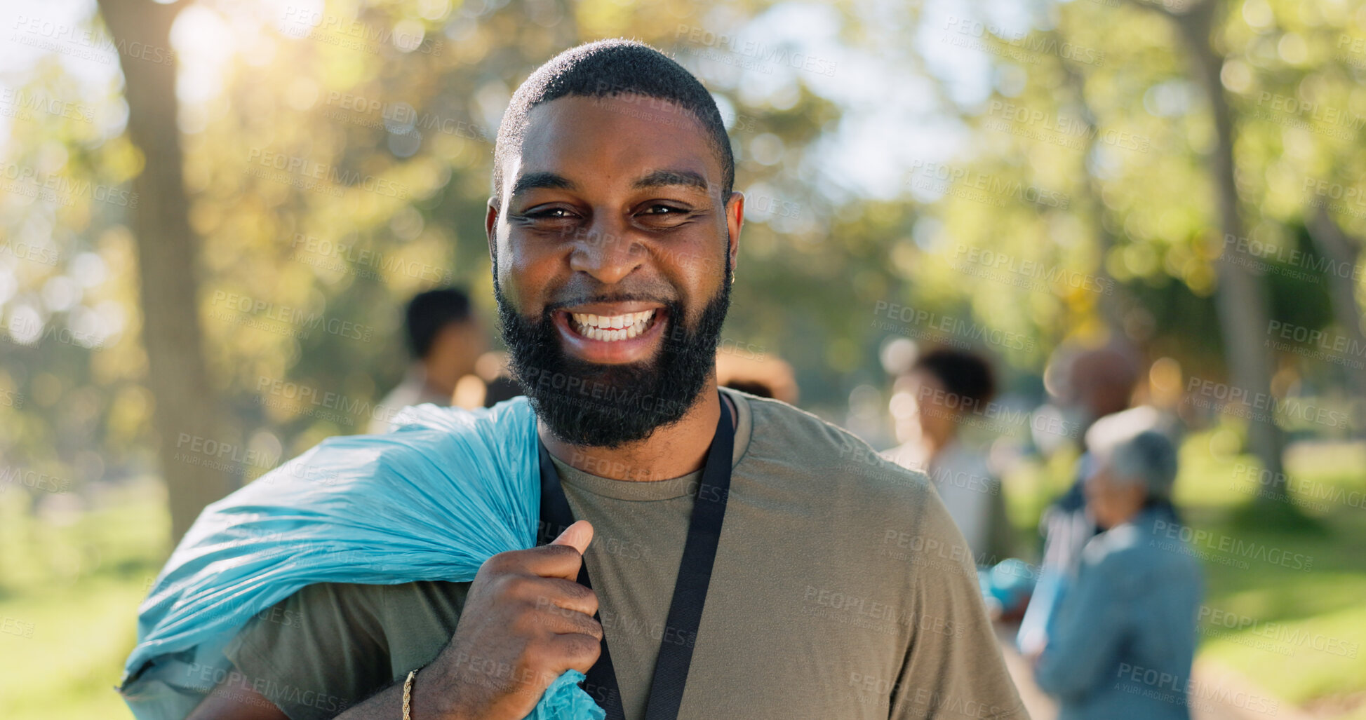 Buy stock photo Man, volunteer and happy portrait with plastic in nature, leadership and environment sustainability project or group. Recycling, waste management and cleaning outside trash, community and support