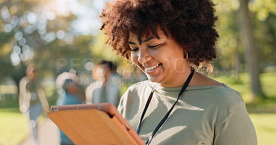 Buy stock photo Woman, volunteer and happy nature with tablet in outdoor, community work and environment sustainability project with group. Recycle, waste management and cleaning outside trash, help and ngo support