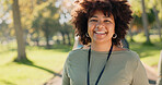 Black woman, portrait and happy in park for charity, volunteer and community service work with donation. African person, smile and green outdoor for change, project or sustainability with NGO support