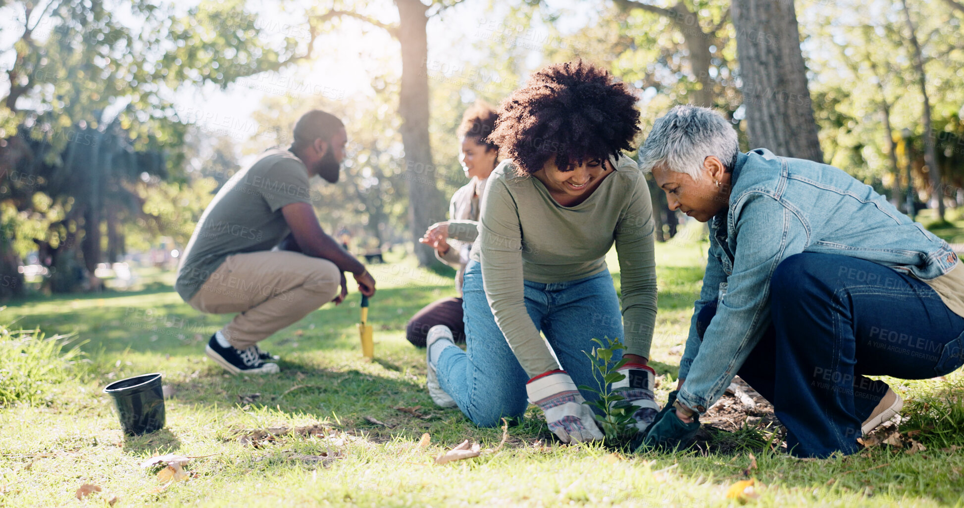 Buy stock photo Planting, support and community people in park, nature and garden for sustainable environment. Collaboration, climate change and volunteers with plants, growth and green ecology for earth day