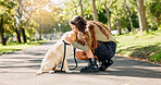 Park, kiss and woman with dog in nature for walking, playing and training outdoors together. Friendship, animal rescue and happy person with pet Labrador for behavior, bonding and fun together