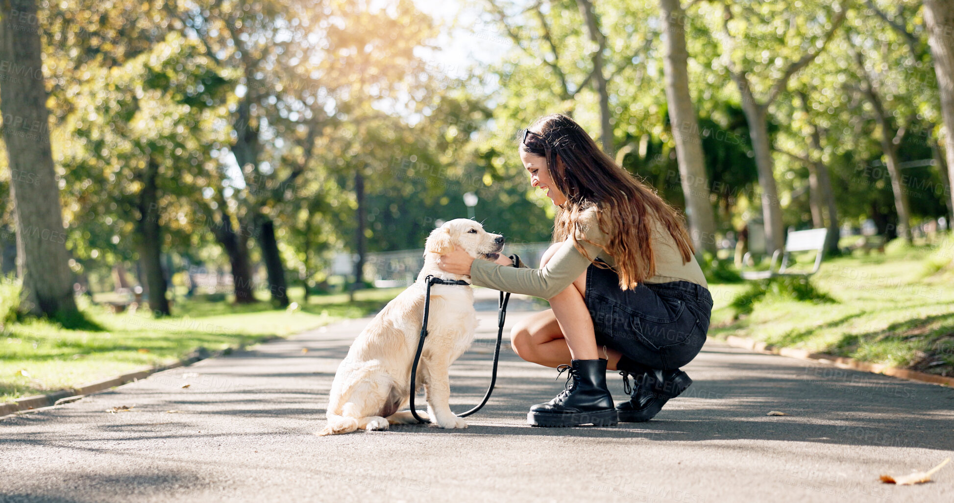 Buy stock photo Woman, dog and park with friendship, bonding and happy for wellness, travel and journey on island. Female person, cheerful and pet care with walk, fresh air in outdoor on path in nature for training
