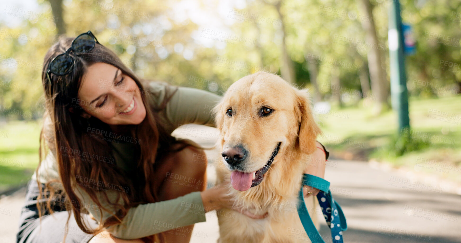 Buy stock photo Happy woman, dog and park with friendship, bonding and wellness, travel and journey in England. Female person, cheerful and pet care with relax, fresh air in outdoor on path in nature for training
