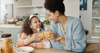 Kitchen, mother and girl with smile, juice and cheers for breakfast, bonding and love in house. Home, mom and daughter in apartment, happy and care for family, woman and child with joy and relax