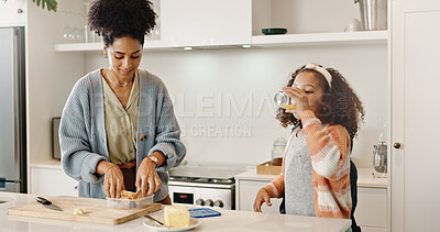 Buy stock photo Mother, child and packing sandwich for school lunch or preparing in home kitchen, morning or student. Woman, daughter and breakfast drink in apartment or nutrition meal for education, snack or health