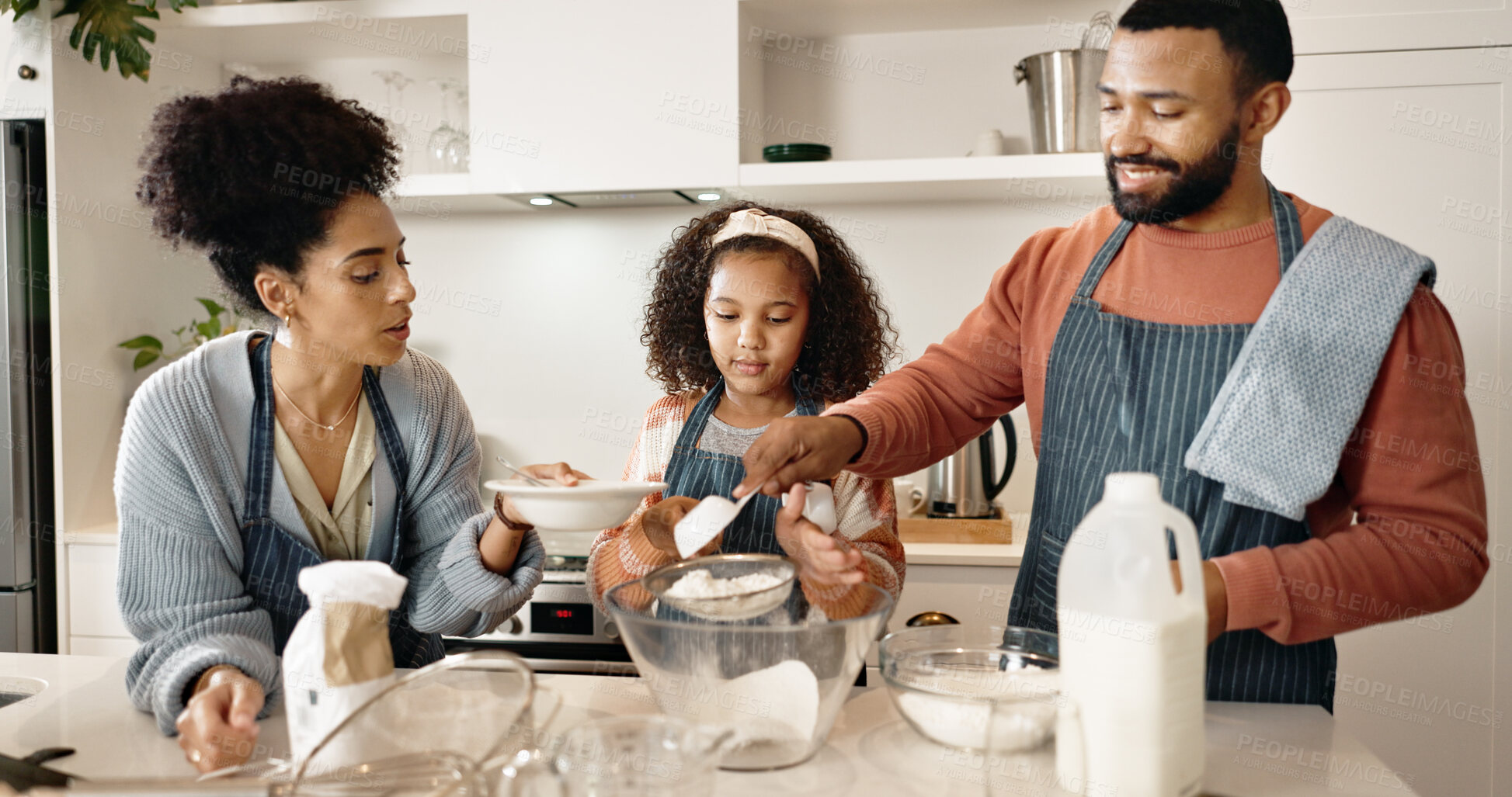 Buy stock photo Family, child and baking in kitchen or house, cooking and learning together with parents in apartment or culinary. Food, treat and girl preparation and sifting flour, love and childhood development