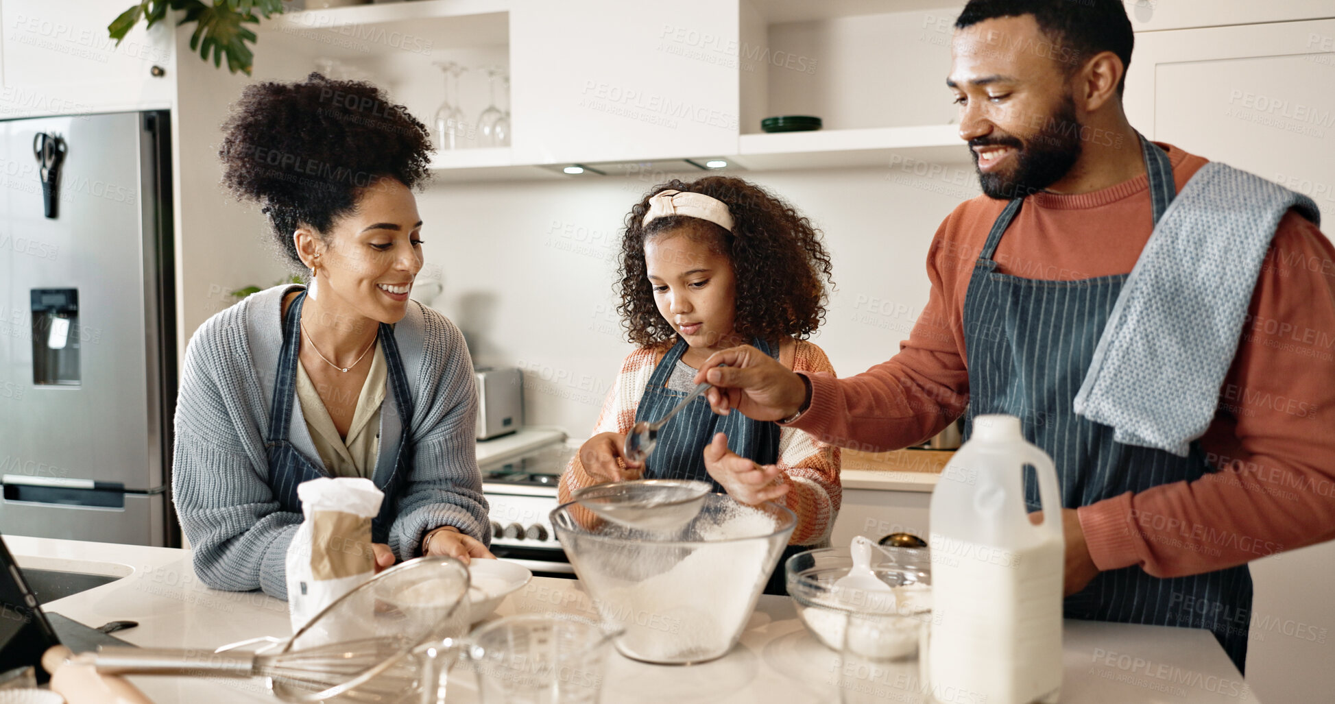 Buy stock photo Family, child and baking in kitchen or house, cooking and learning together with parents in apartment or culinary. Food, treat and girl preparation and sifting flour, love and childhood development