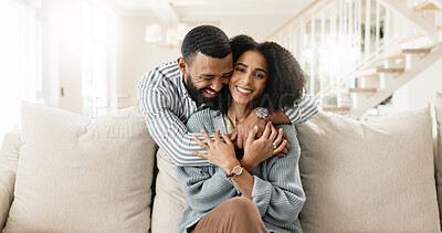 Buy stock photo Couple, portrait and hug or relax on sofa for date night or weekend break, romance and happiness with love or commitment. Man, woman and bonding on couch in new apartment or home, affection and care.