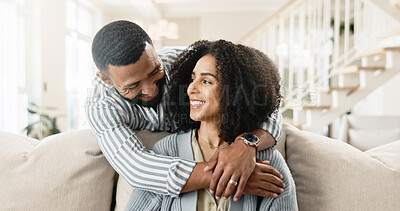 Buy stock photo Couple, love and hug or relax on sofa for date night or weekend break, romance and happiness with embrace or commitment. Man, woman and bonding on couch in new apartment or home, affection and care.