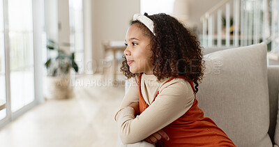 Buy stock photo Young girl, thinking and sofa with dream for vision or thoughtful mindset in living room at home. Little female person, child or kid in wonder or thought on lounge couch for reflection or perception