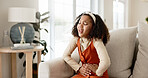 Young girl, stomach ache or allergies on couch in home for health problem or digestion recovery on weekend. Child, pain or food poisoning in living room with cramps for belly discomfort and suffering