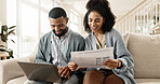 Couple, man and woman with laptop on sofa for online research and reading blog, with newspaper in home. Love, male and female person together with technology on couch for internet connection