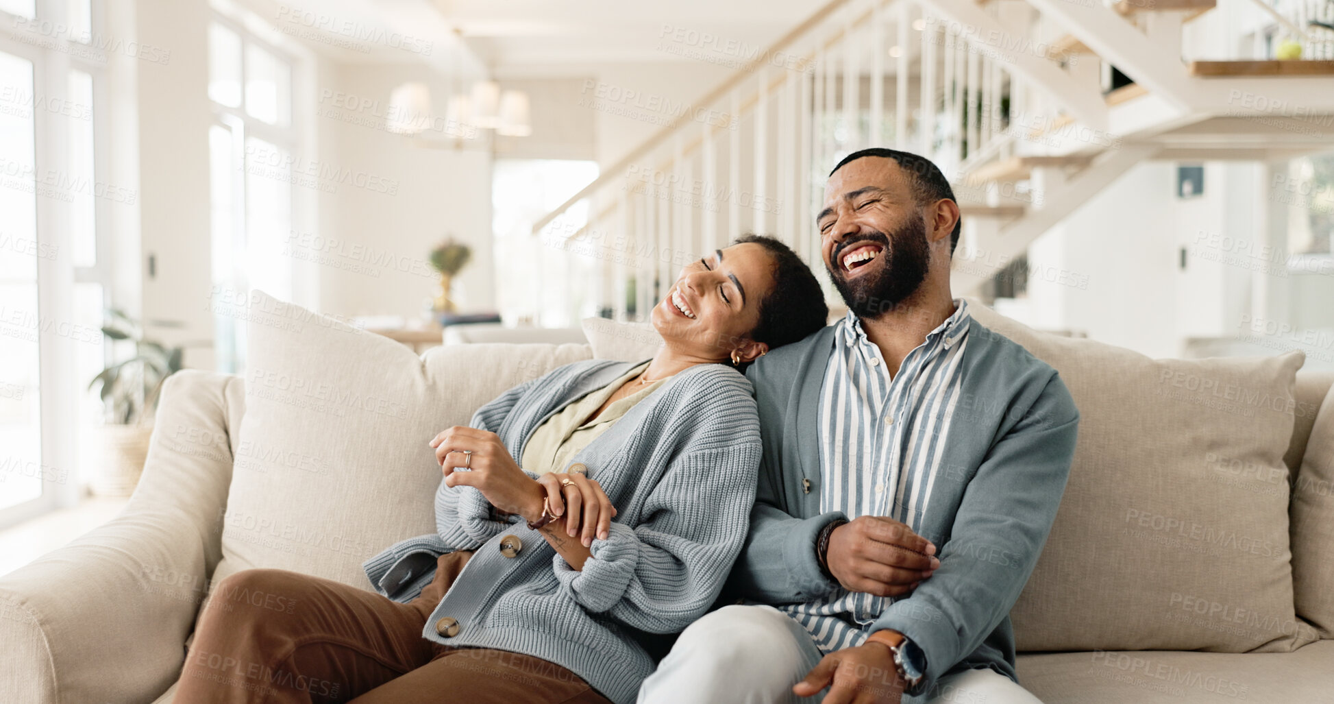 Buy stock photo Happy couple, laughing and sofa for funny joke or humor bonding in home, marriage or living room. Man, woman and relationship conversation or apartment relax with boyfriend or together, house or chat