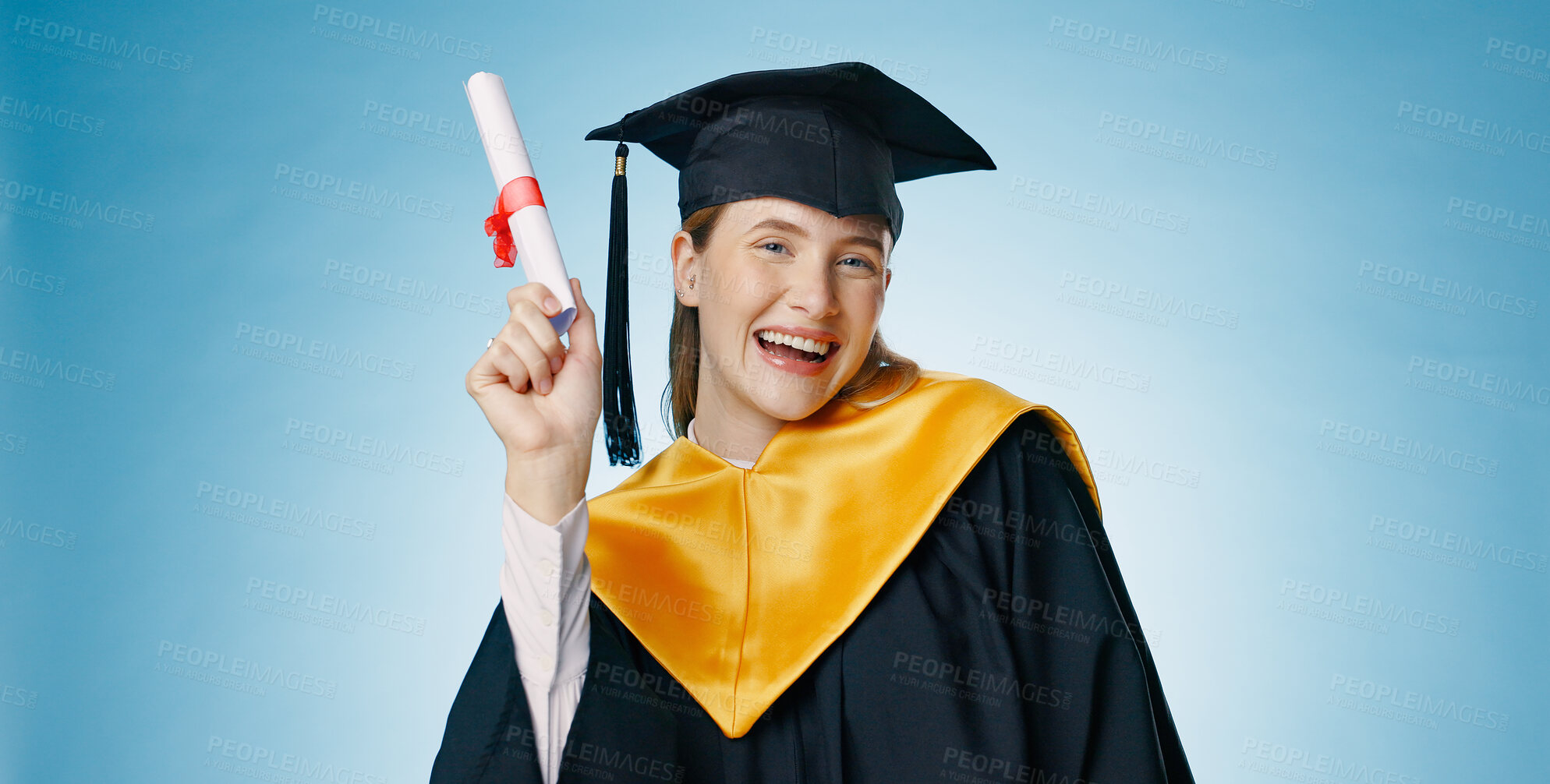 Buy stock photo Graduation, success and woman with certificate in studio portrait for study achievement, news or education. Student with celebration and excited for scholarship or college diploma on blue background