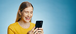 Happy, woman and phone text in studio with social media, smile and meme with internet search. Digital, email and technology with typing, blog and mobile app with notification and web message