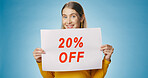 Poster, discount and portrait of woman on blue background for news, announcement and information. Shopping, advertising and happy person with billboard for price sale, deal and bargain in studio