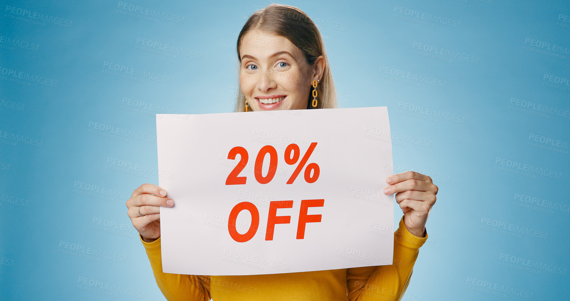 Buy stock photo Poster, discount and portrait of woman on blue background for news, announcement and information. Shopping, advertising and happy person with billboard for price sale, deal and bargain in studio