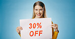 Poster, bargain and portrait of woman on blue background for news, announcement and information. Shopping, advertising and happy person with banner or sign for price discount, deal and sale in studio
