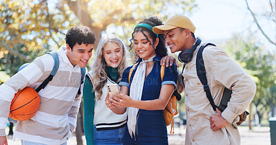 Buy stock photo Young students, diversity and reading with phone in nature for discussion, social media or news on campus. Group of people with mobile smartphone for online chatting, texting or research at college