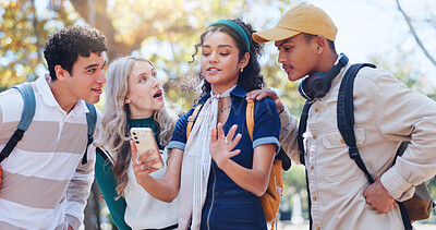 Buy stock photo Young people, diversity and students with phone in nature for discussion, social media or news on campus. Group of friends with mobile smartphone for online chatting, texting or research at college