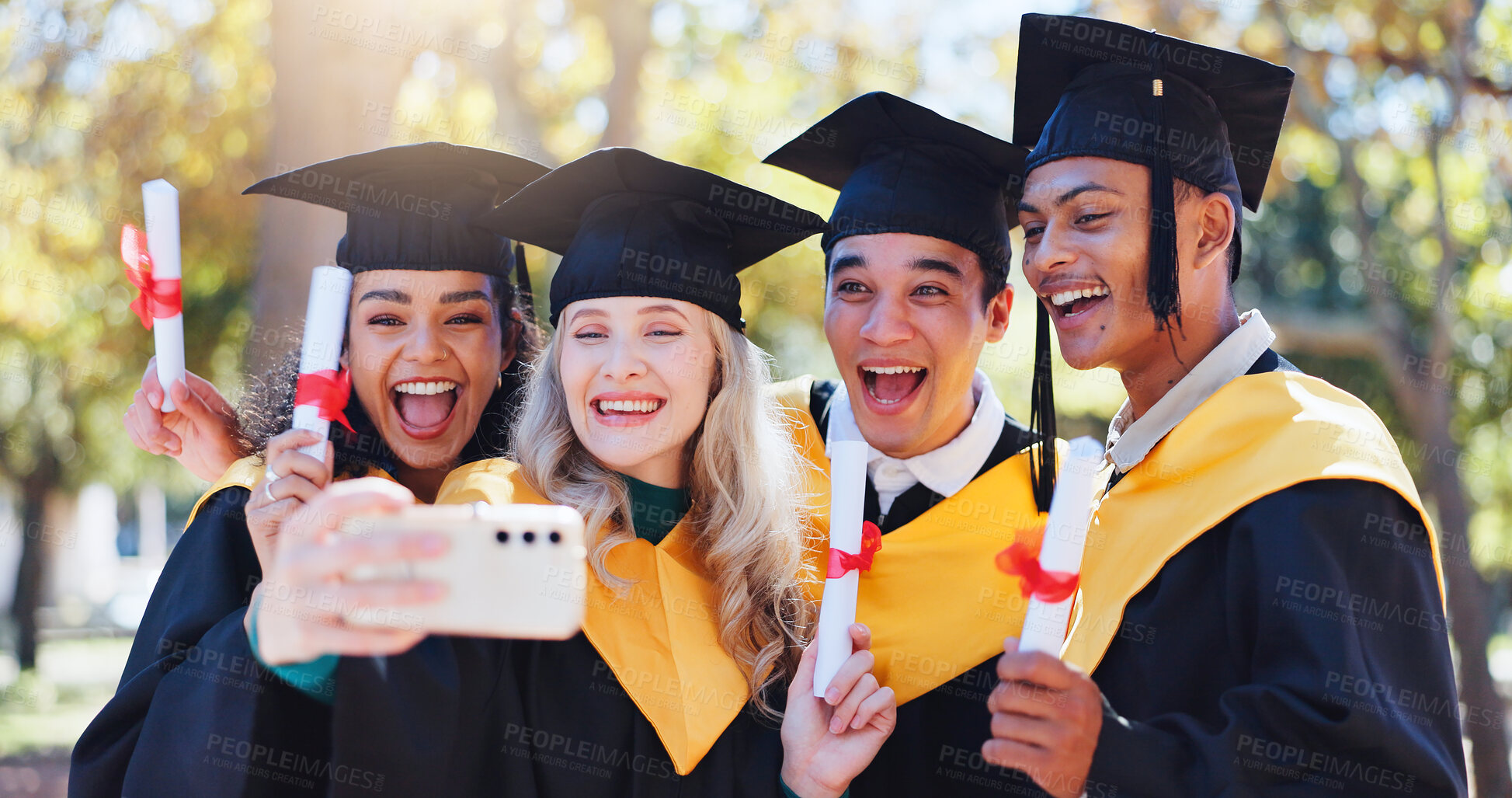 Buy stock photo Happy students, graduation and celebration with selfie for memory, certficate or diploma in nature. Group of young and excited graduates with smile in photography, picture or moment for qualification