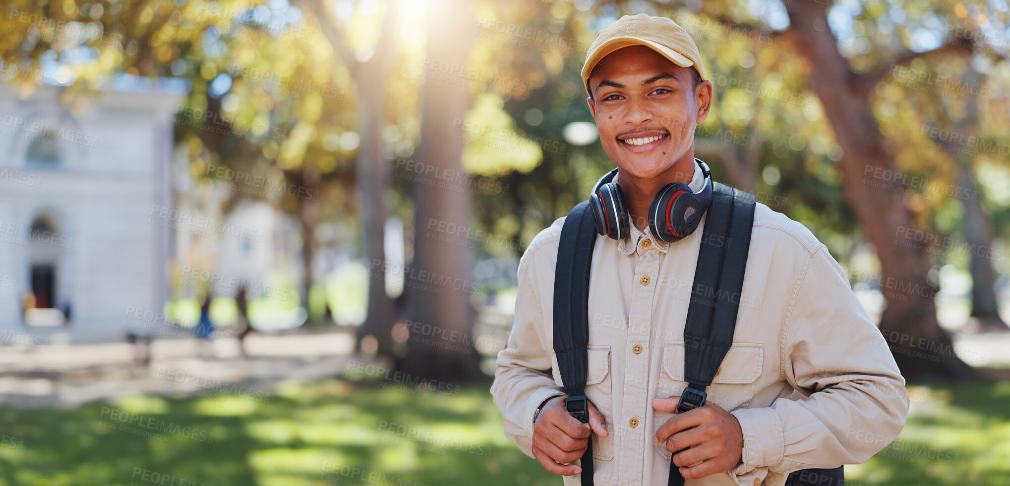 Buy stock photo Travel, man and park portrait on college campus in New York with backpack and study break. Happy, smile and education of a post graduate student with confidence and commute outdoor with education