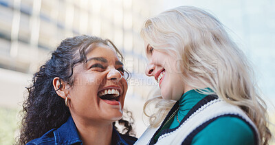 Buy stock photo Happy, woman and friends laughing outside in city together, bonding and relationship with diversity people downtown. Smile, support and funny female person and joke conversation, gossip and travel
