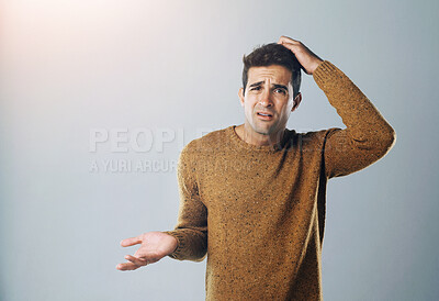 Buy stock photo Man, confused and scratch head in studio portrait with decision, lost and mistake by background. Person, doubt and choice with mockup space for crisis, stress and error with wondering for solution