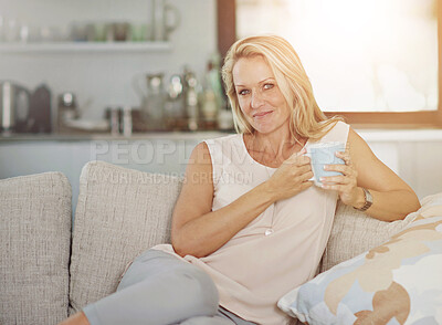 Buy stock photo Mature, woman and portrait with tea on sofa for relax, wellness and weekend break with comfortable in home. Person, happy and drinking coffee on couch in living room with smile, peaceful and beverage