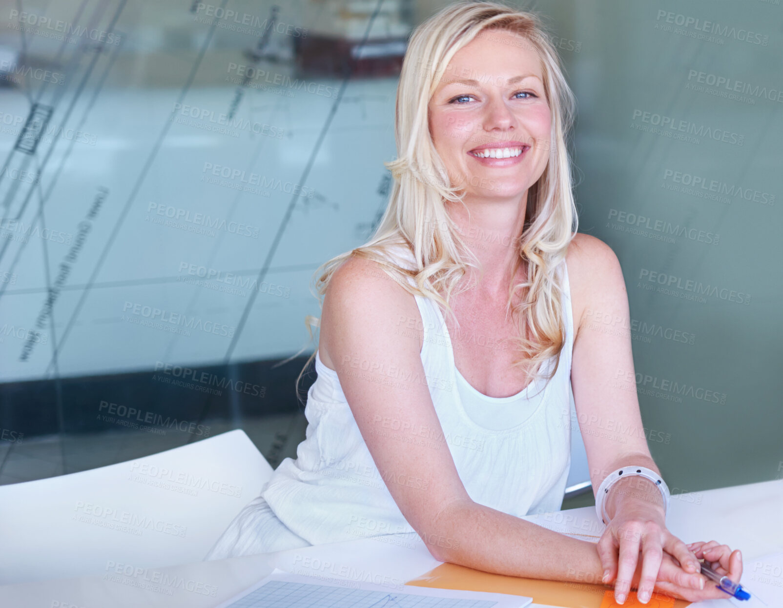 Buy stock photo Portrait, happy business woman at desk or creative professional entrepreneur in office. Face smile, designer or employee at table, worker or young blonde person in Australia for startup career or job