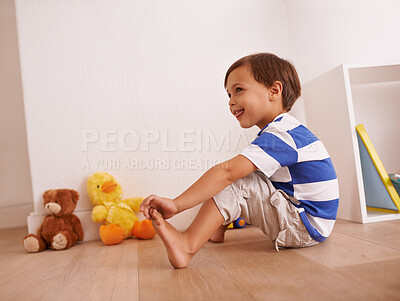 Buy stock photo Floor, boy or child with smile for playing and learning with development and growth at home in playroom. Happiness, activity and playful with teddy bear, young toddler kid and fun games for 