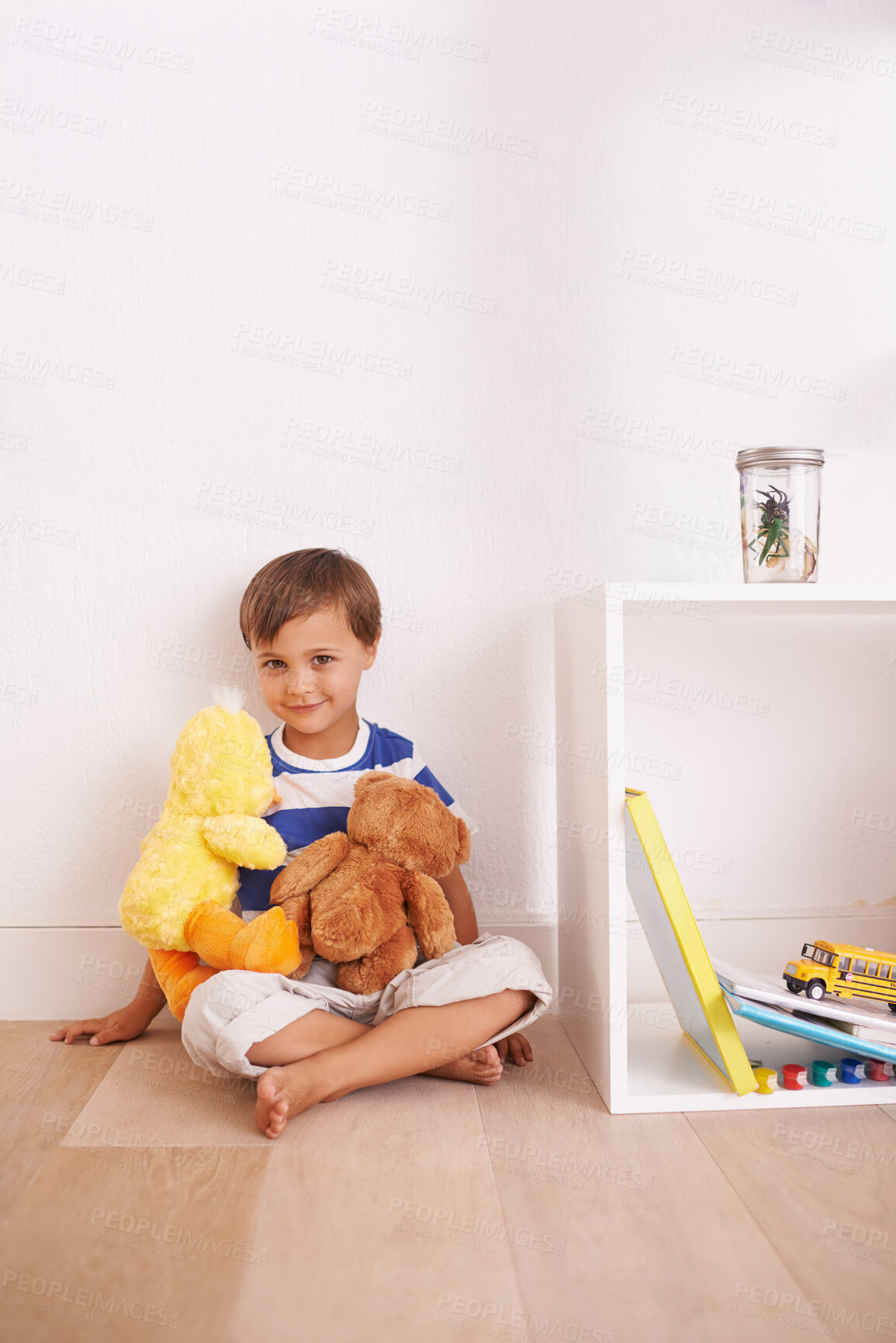 Buy stock photo Child, toy and portrait with teddy, smile and happiness for fun and joy at home or daycare. Boy, play and positive with stuffed animal, laugh and childcare for growth and cheerful on wood floor