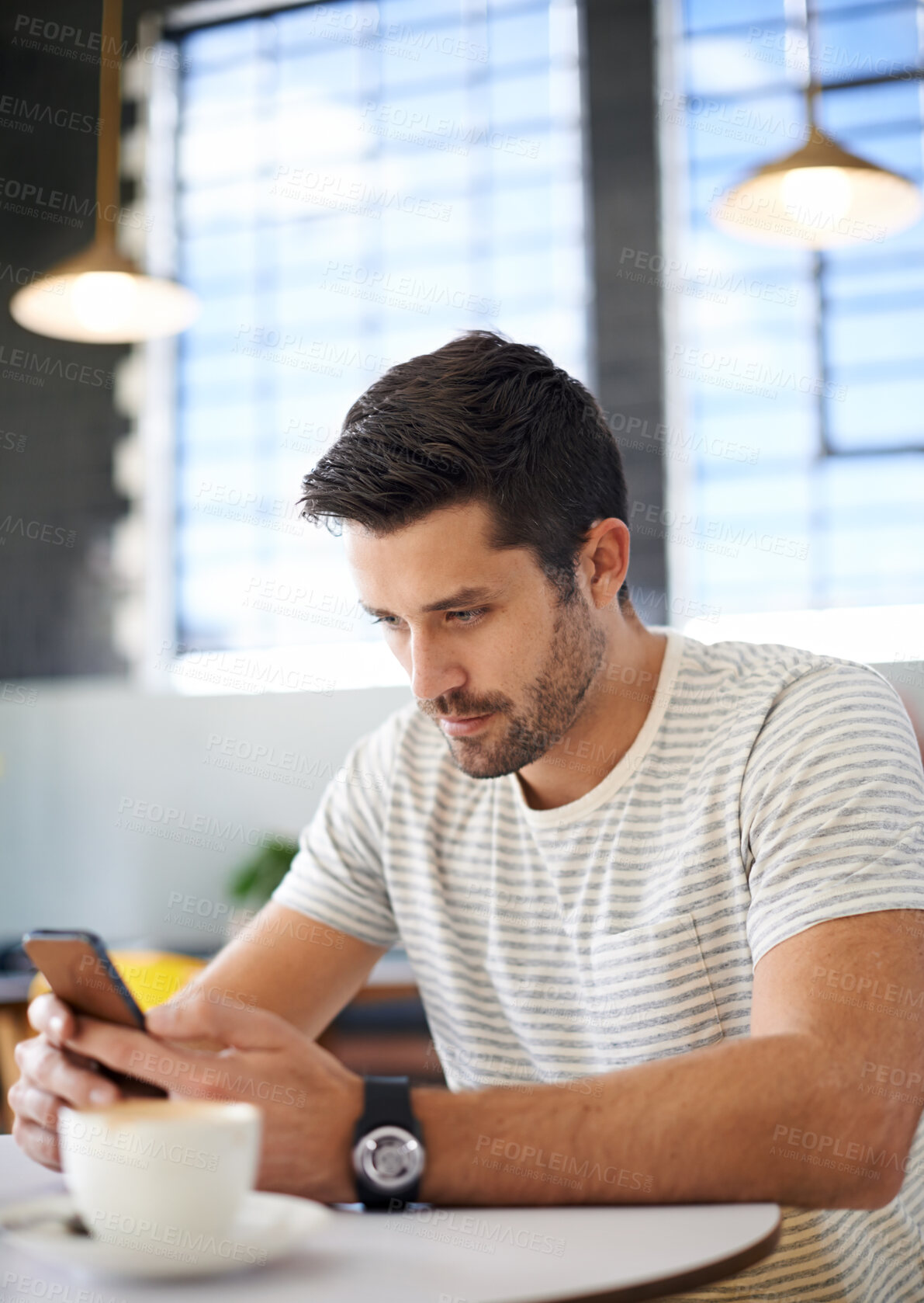 Buy stock photo Man in coffee shop, smartphone and scroll on social media, reading on mobile app or ebook with communication and contact. Chat, email or text message with tech, search internet and online at cafe