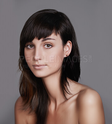 Buy stock photo Woman, portrait and beauty with tattoo for haircare, style or facial treatment on a gray studio background. Face of female person or young model with confidence for body art, design or creativity