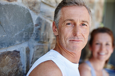 Buy stock photo Fitness, happy and portrait with mature couple outdoor on brick wall for running or training together. Exercise, running and face of man with woman at start of daily workout routine to improve health