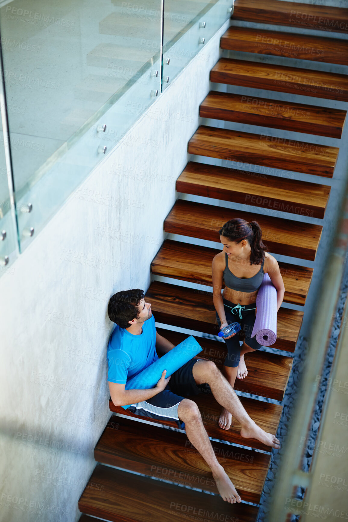 Buy stock photo Stairs, rest and man with woman for fitness, calm workout, yoga class and share health advice. Friends, exercise break and couple by steps for wellness and gossip conversation after training together