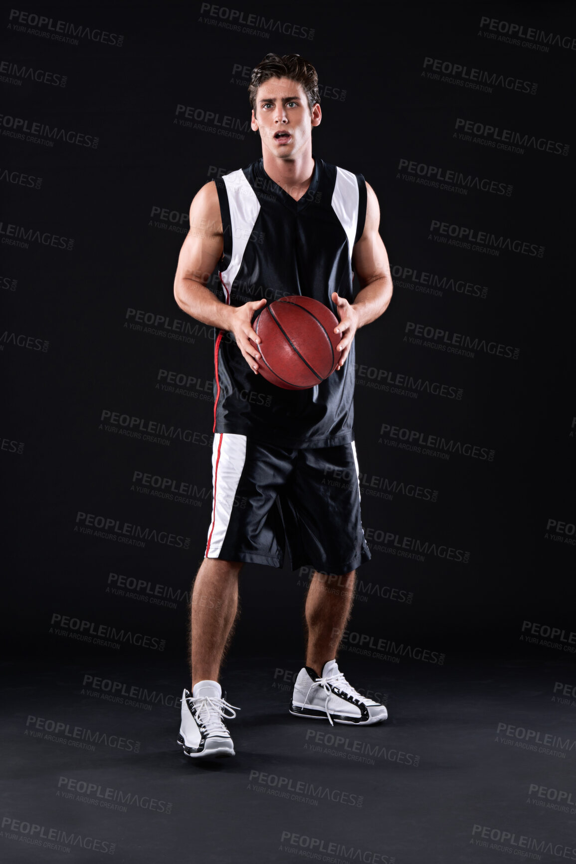 Buy stock photo Fitness, basketball and man athlete in studio with practicing, workout or training for game. Activity, career and male person with sport equipment for match exercise isolated by black background.