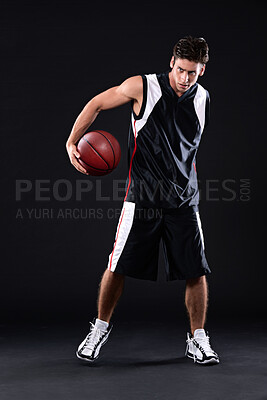 Buy stock photo Fitness, basketball player and man in studio with practicing, workout or training for game. Activity, career and male athlete with sport equipment for match exercise isolated by black background.