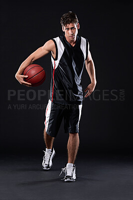 Buy stock photo Fitness, basketball player and portrait of man in studio with practicing, workout or training for game. Activity, career and male athlete with sport equipment for match exercise by black background.