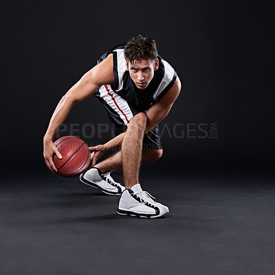 Buy stock photo Basketball, training and portrait of man in studio for exercise, workout or healthy body fitness isolated on black background. Sports, player or athlete dribble ball for competition, action or mockup