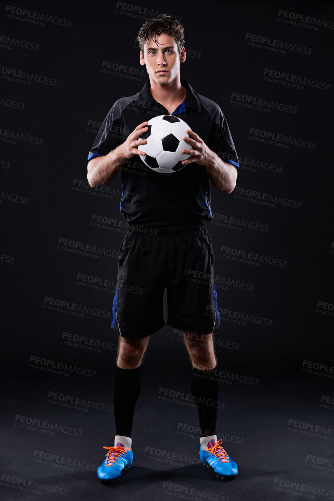 Buy stock photo Sports, soccer ball and man in portrait for training, fitness or practice as athlete or player in football. Male person, passion and game for exercise, wellness and goal on black background in studio