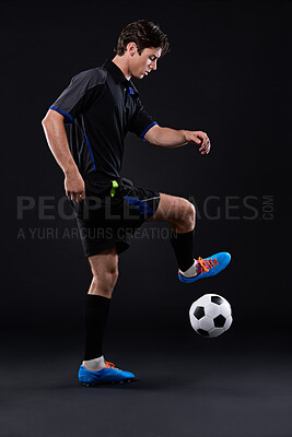 Buy stock photo Man, football and skill for fitness in studio for sports training with exercise isolated on black background. Talent, technique and professional soccer player in Brazil with freestyle ball control