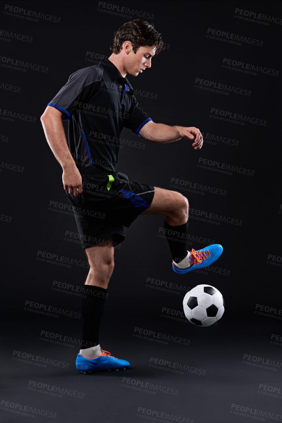 Buy stock photo Man, football and skill for fitness in studio for sports training with exercise isolated on black background. Talent, technique and professional soccer player in Brazil with freestyle ball control