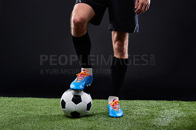 Buy stock photo Grass, soccer player and foot with ball for game, training and action for practice with shoes. Black background, athlete and person with talent for football, outdoor and fitness for sport and goal