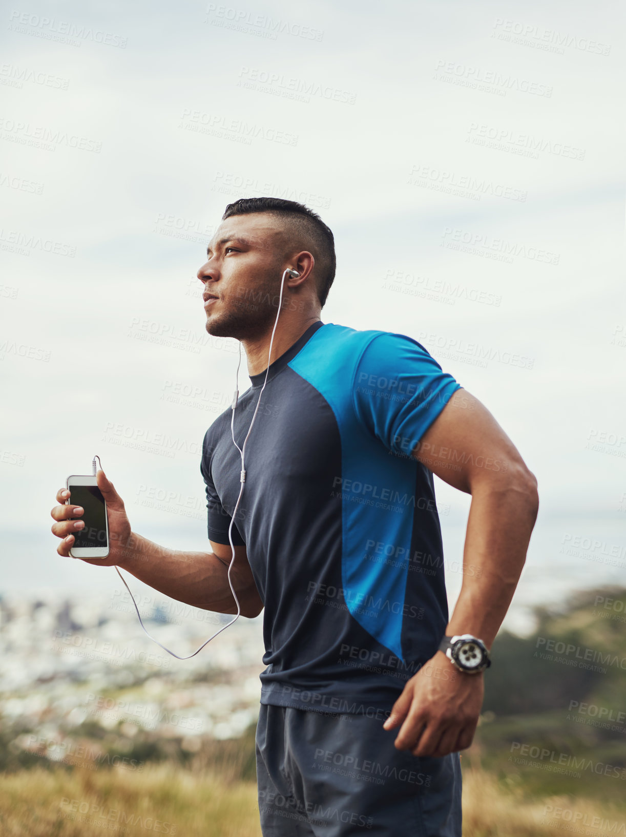 Buy stock photo Man, running and earphones in nature for fitness, smartphone and wellness training or marathon challenge or sport. Listening, music and motivation audio or radio for body health, outdoor and athlete