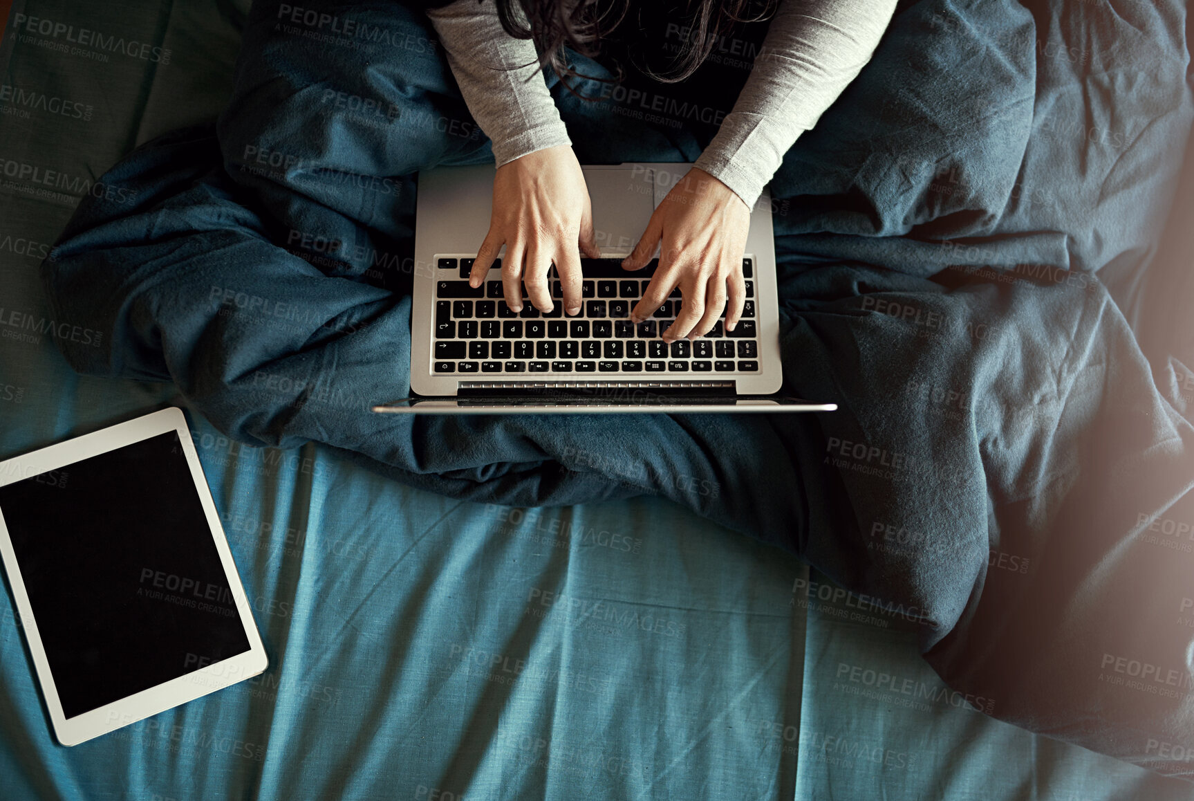 Buy stock photo Laptop, tablet and woman hands typing on bed for research on creative project with book report online. Bedroom, mockup and female copywriter work on computer and digital technology from above at home