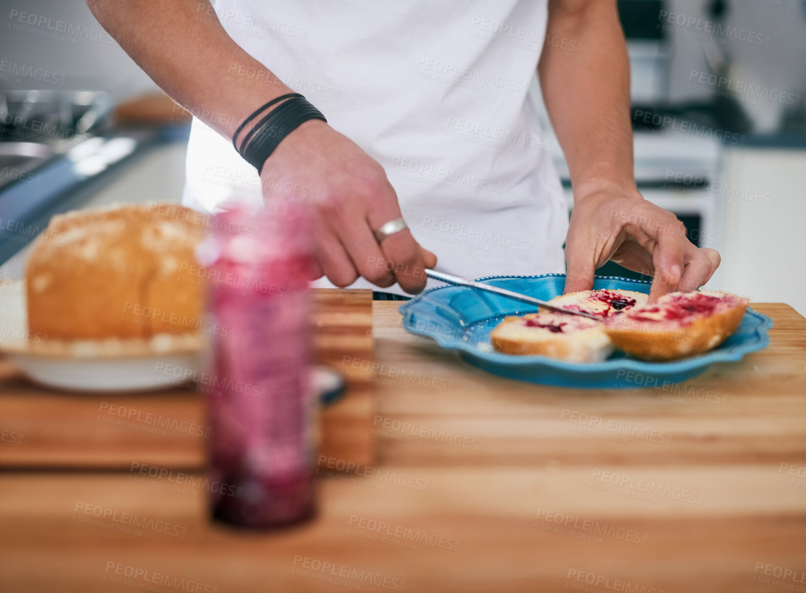 Buy stock photo Man, hands and jam with bread in kitchen for breakfast, morning meal or fruit spread on snack at home. Closeup of male person with sandwich, wheat or food for healthy nutrition, fiber or sweet toast