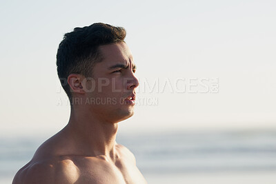 Buy stock photo Fitness, thinking and man on beach in morning for workout, exercise and training outdoors for surfing. Nature, athlete and confident person by sea and ocean for wellness, health and water sports