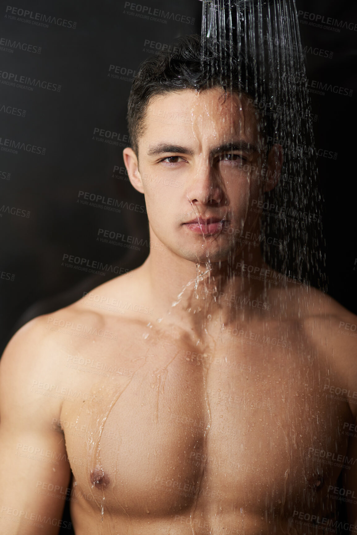 Buy stock photo Shower, water and man with portrait in studio with body cleaning, care and morning routine. Hygiene, wellness and skincare for dermatology and skin glow with washing, grooming and black background